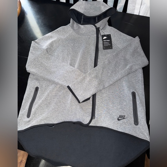 Nike Jackets & Blazers - NWT. Nike Woman’s Gray Hooded Tech Fleece Cape. Size XL.